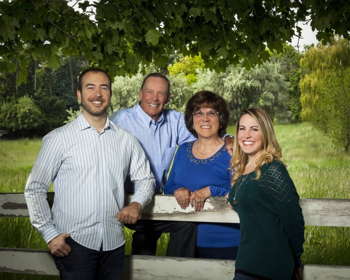 A family picture outdoors at Addison Photography.